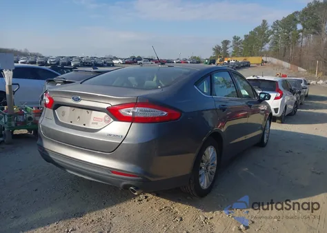 2014 Ford Fusion Hybrid S z USA, uszkodzony, nr VIN 3FA6P0UU2ER359933